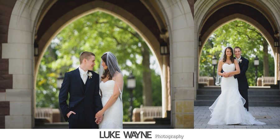 Wedding portraits: couple under stone arches, posing. Bride in white gown, groom in suit. Green trees in background.