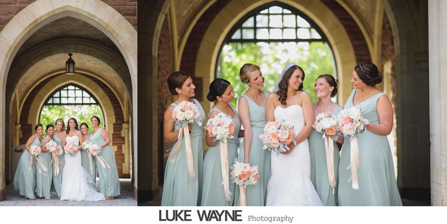 Bride and bridesmaids in sage green dresses pose under arches, holding bouquets.