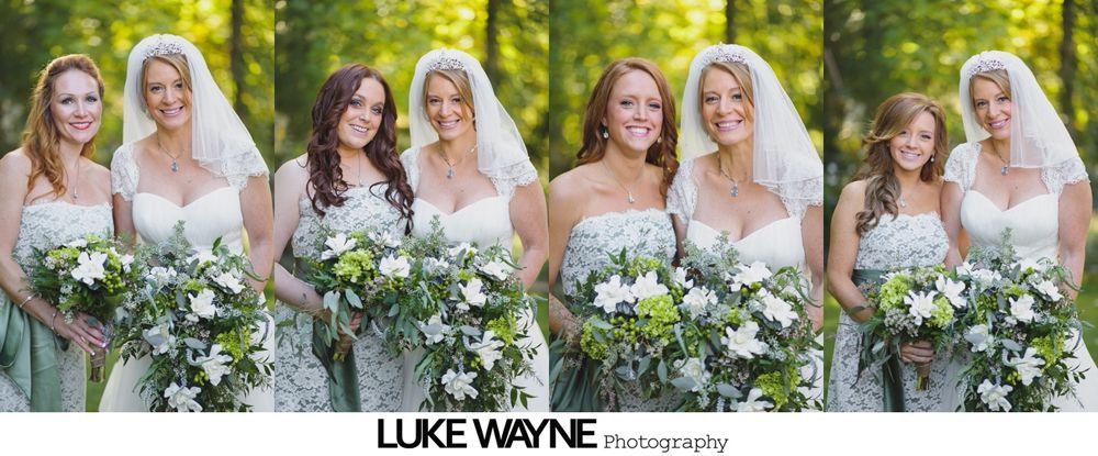 Wedding party, couple in formal attire, posing in a grassy area among trees, black and white photograph.