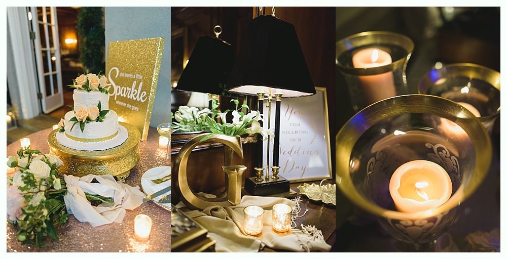 Gold, white, and black wedding decor featuring cake, lamp, flowers, and candles.