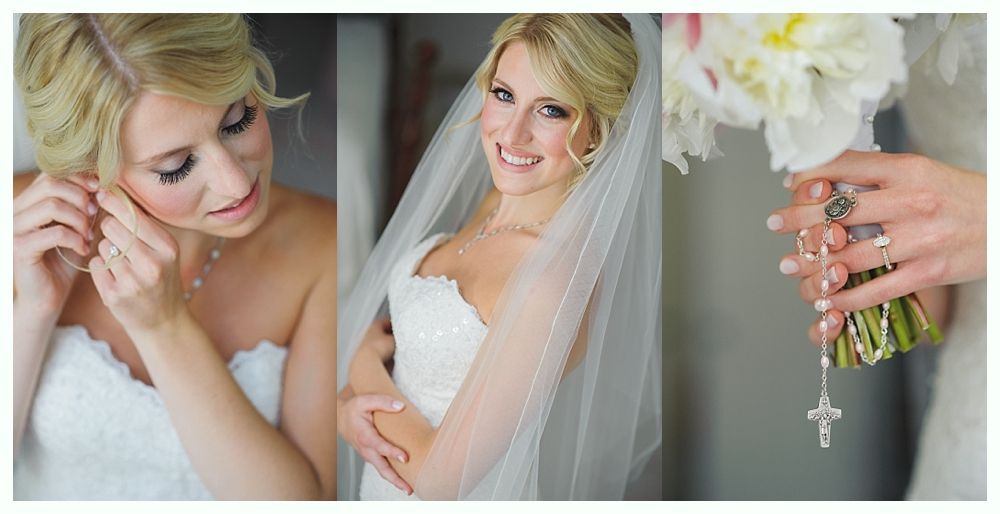 Bride putting on earrings, smiling in a strapless gown, holding a bouquet with rosary beads.