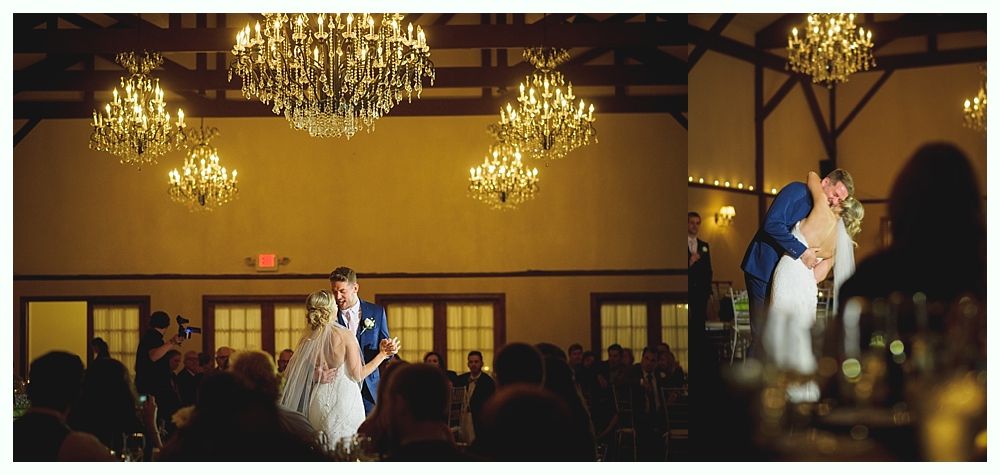 Wedding reception with couple dancing under chandeliers.