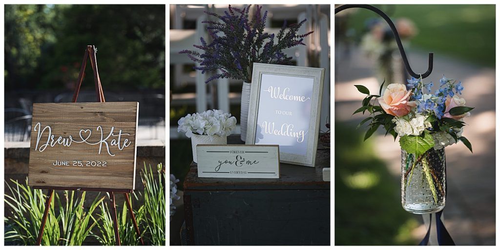 Wedding decor: wooden sign, floral arrangements, mason jar, with a soft, natural setting.
