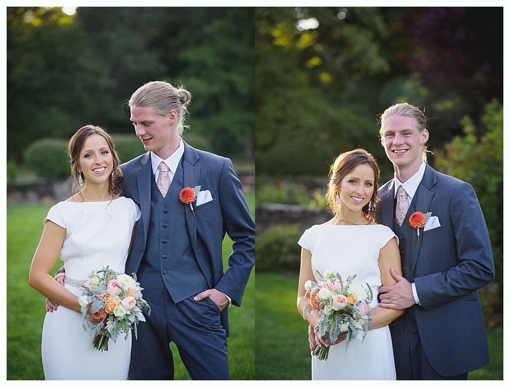 Bride with arms up, making a funny face, groom looking at his hand, cake cutting in background.