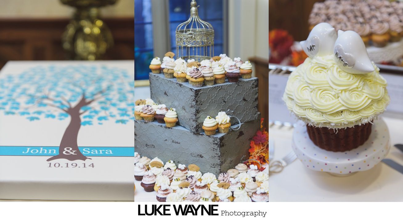Three wedding reception elements: guest book, tiered cupcake tower with birdcage, and large cupcake with bird toppers.