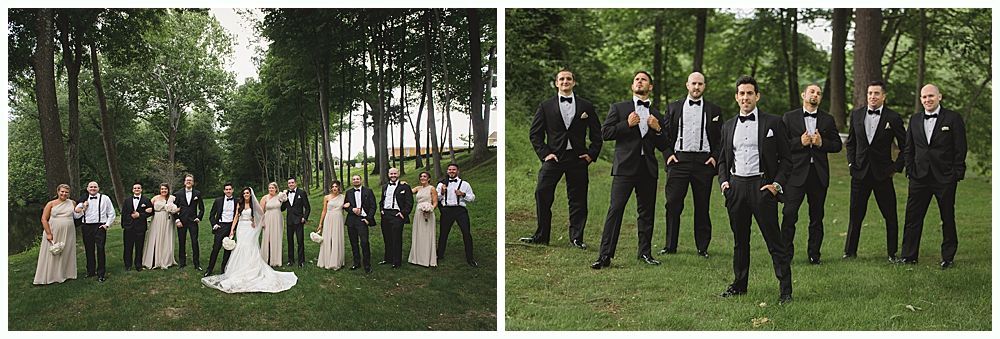 Wedding party in formal attire poses outdoors on grass, under trees.