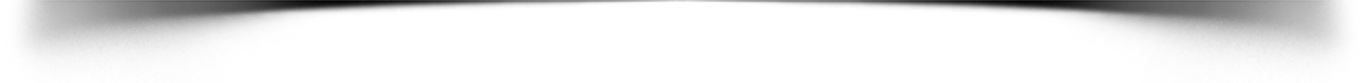 Close-up of a blurred black gradient fading into white from top to bottom.