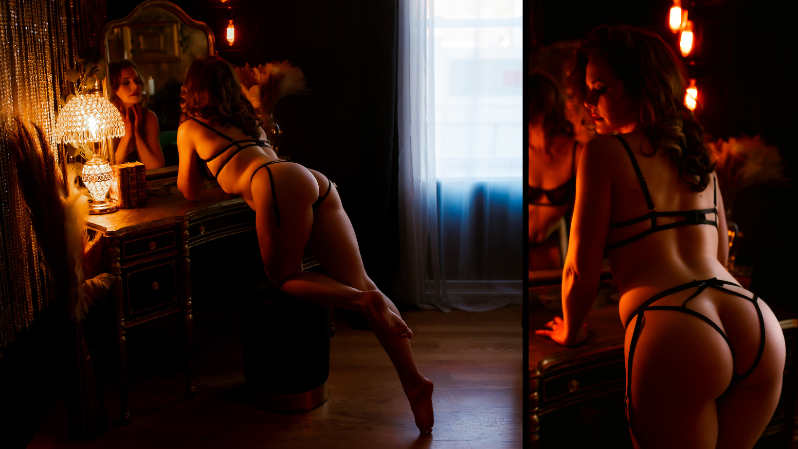 Dimly lit boudoir scene with a woman posing in black lingerie beside a vanity and warm lights.