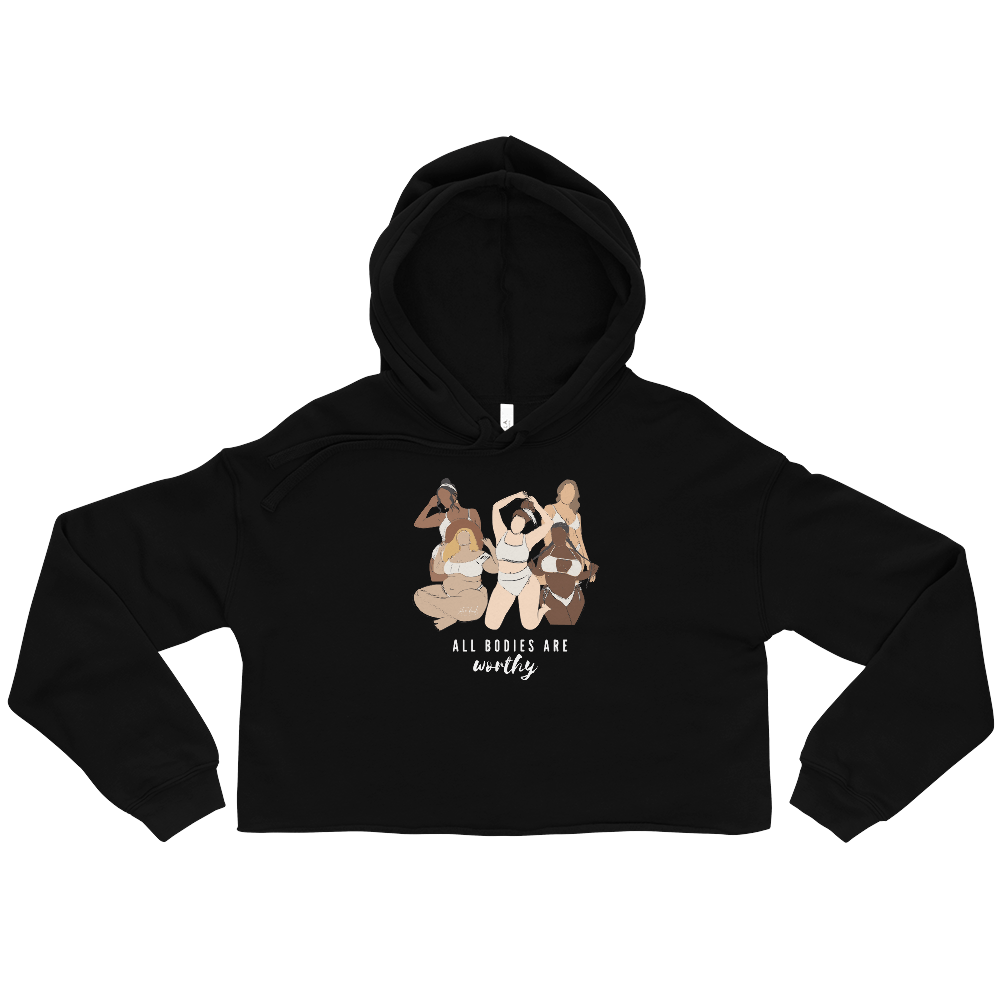 A black crop top hoodie with a picture of three people on it.
