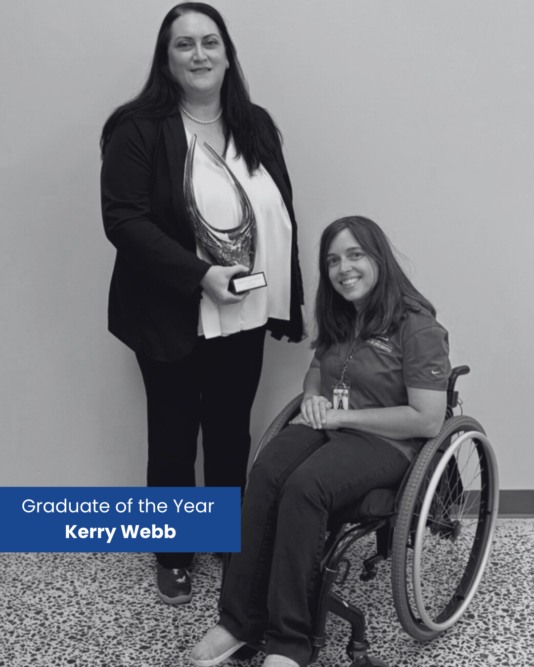 Woman in wheelchair and standing woman holding an award.