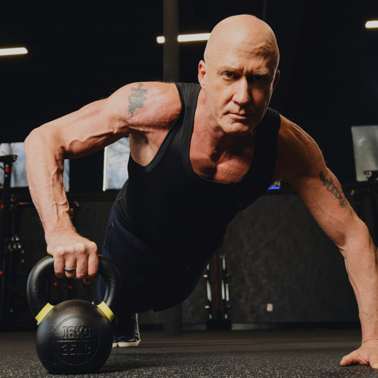 Client, Happiness Warrior, Eric North - Working out with a kettlebell