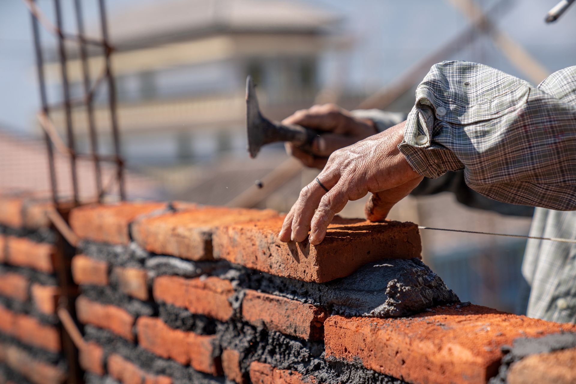 Worker Installing Brick Masonry — Lansing, MI