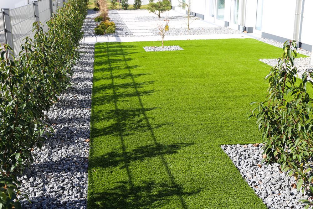 A Manicured Lawn with Grass, Bordered by Gravel Paths — Ballina Turf Farm in Woodburn, NSW