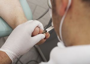 foot doctor imprinting child's footprint for diabetic foot care in the Niagara Falls, NY area