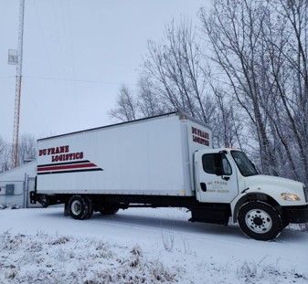 A white moving truck with Du Frane Logistic Logo.