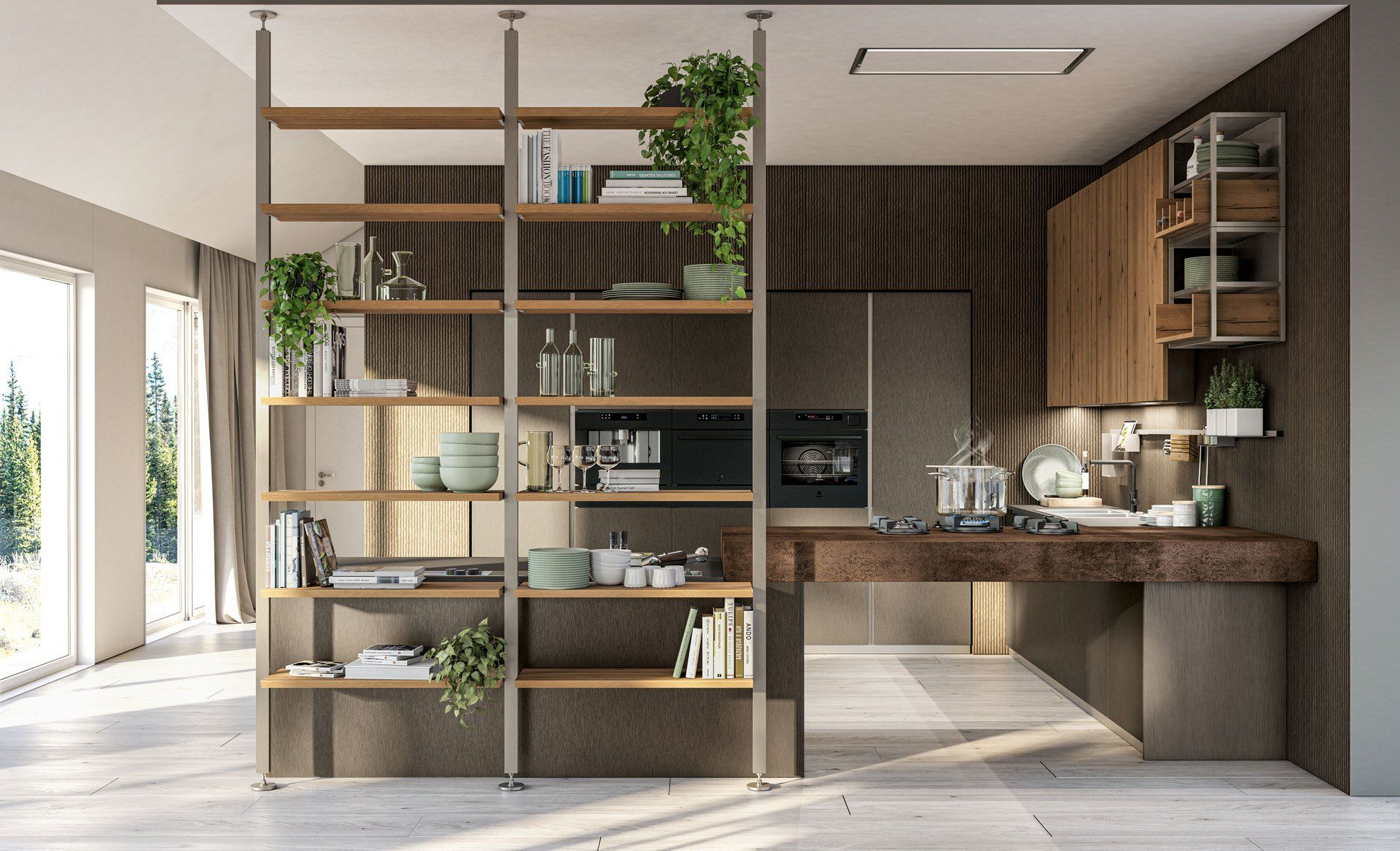 Cucina moderna con libreria divisoria, mobili in legno chiaro ed elettrodomestici da incasso.
