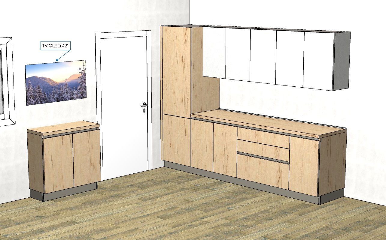 Una cucina con mobili in legno chiaro, compresi i pensili e i mobili inferiori. Sono presenti anche una porta e un quadro.