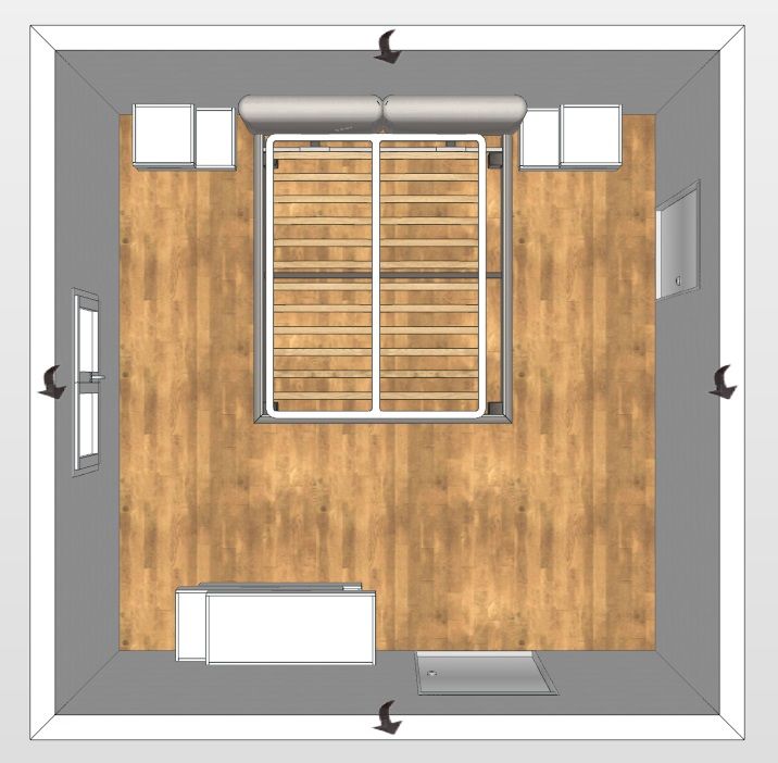 Vista dall'alto di una camera da letto con letto, comodini, cassettiera e tappeto su un pavimento in legno.