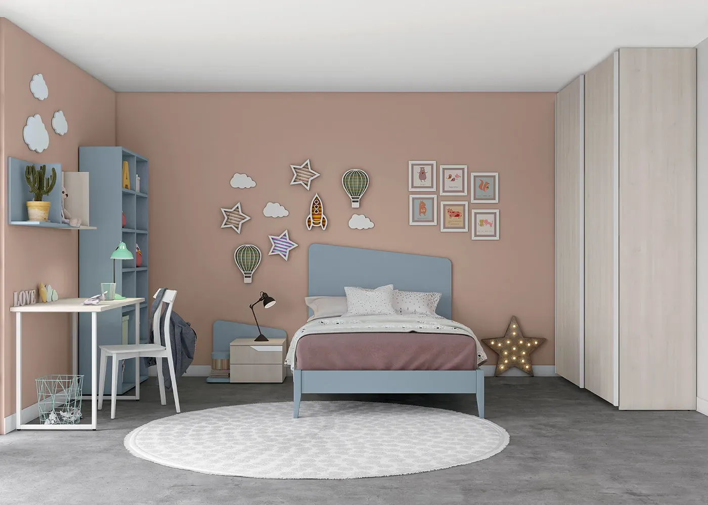 La cameretta di un bambino con un letto blu, una scrivania e una libreria contro una parete rosa, decorata con decorazioni.