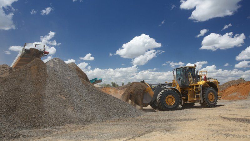 Bulldozer Loading Up Sand —  Quarry Products In Moranbah, QLD