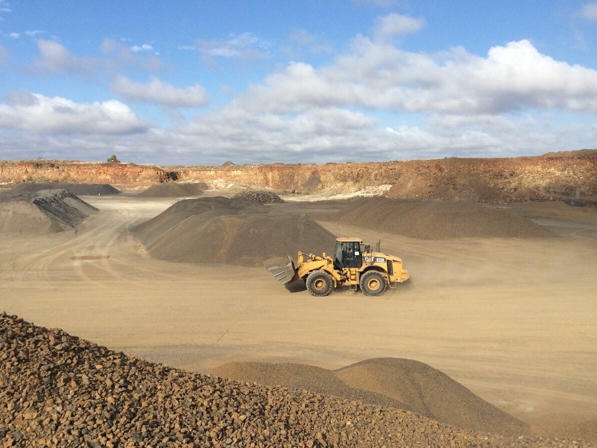 Truck On Dirt In Quarry — Quarry Products In Moranbah, QLD