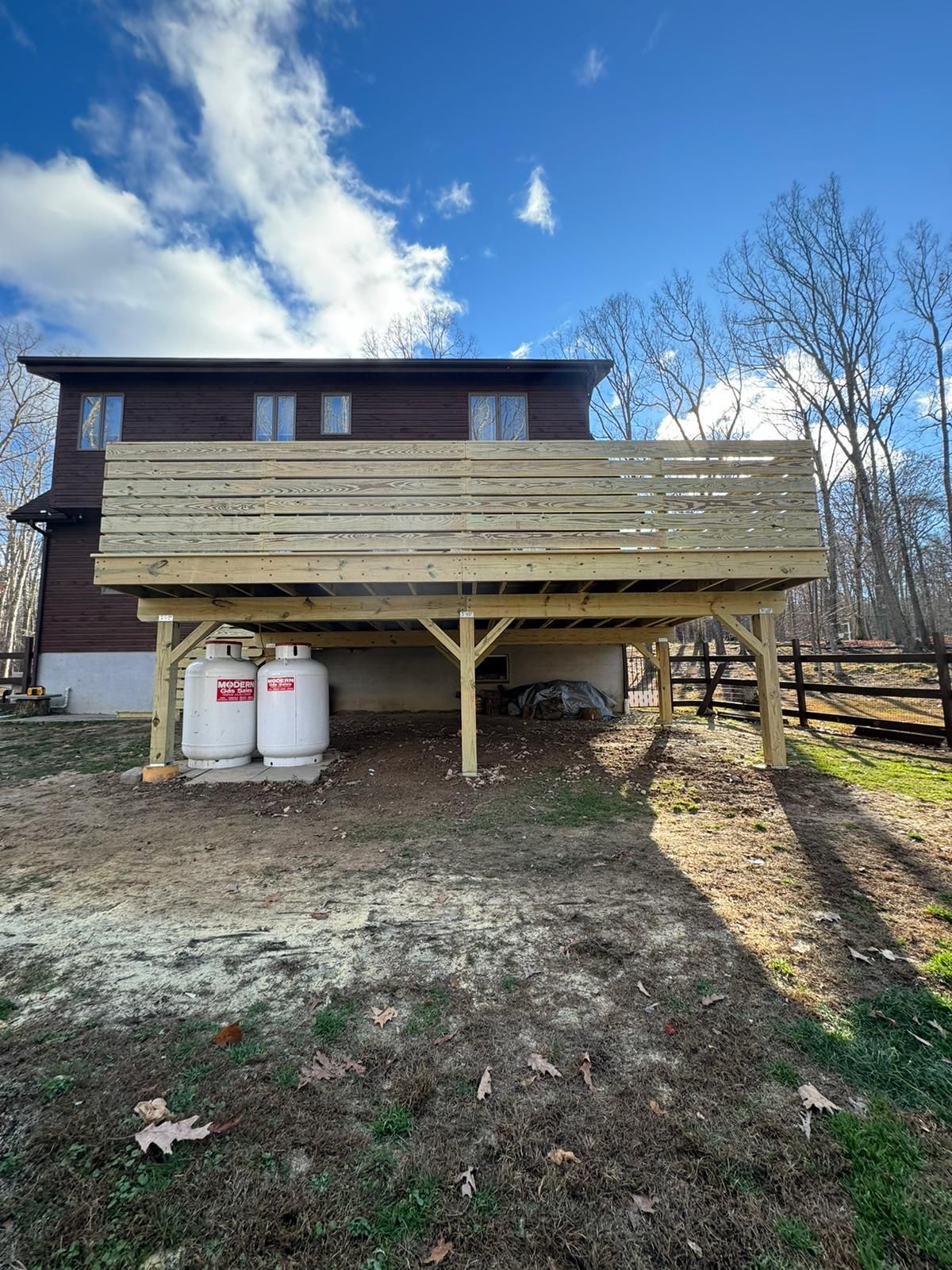 A ground view of a second story deck