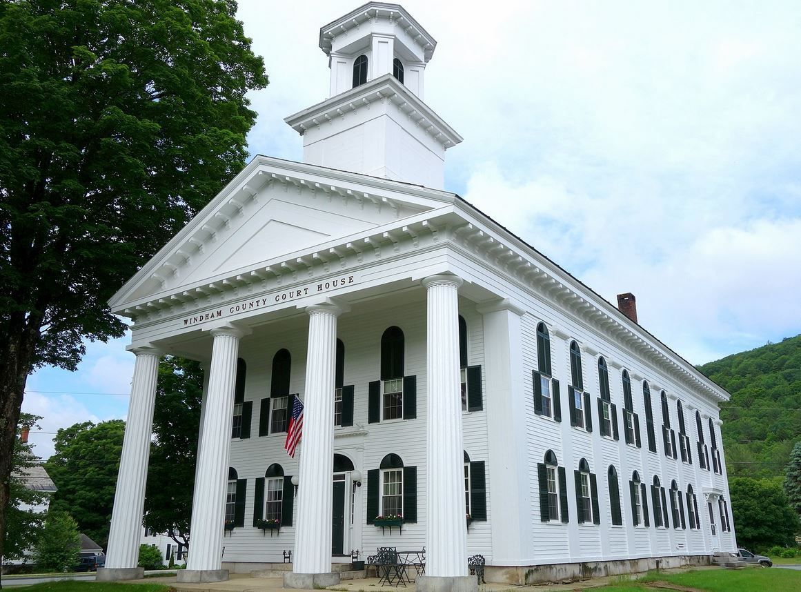 The town of brandon logo is a black and white image of a building.