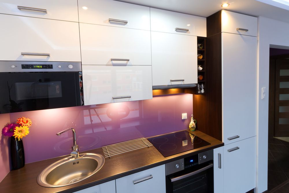 A Kitchen With White Cabinets and a Purple Backsplash — Kreuzer Cabinets In Gundagai, NSW