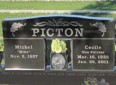 Black granite Picton cemetery headstone with flowers and inscriptions for Michel and Cecile