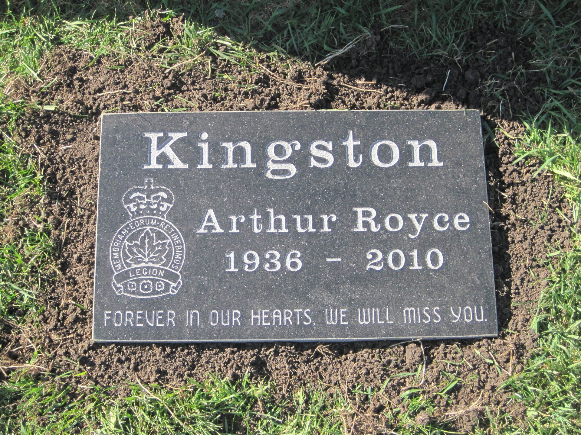 Gravestone for Kingston Arthur Royce, 1936–2010, with “Forever in our hearts, we will miss you.”
