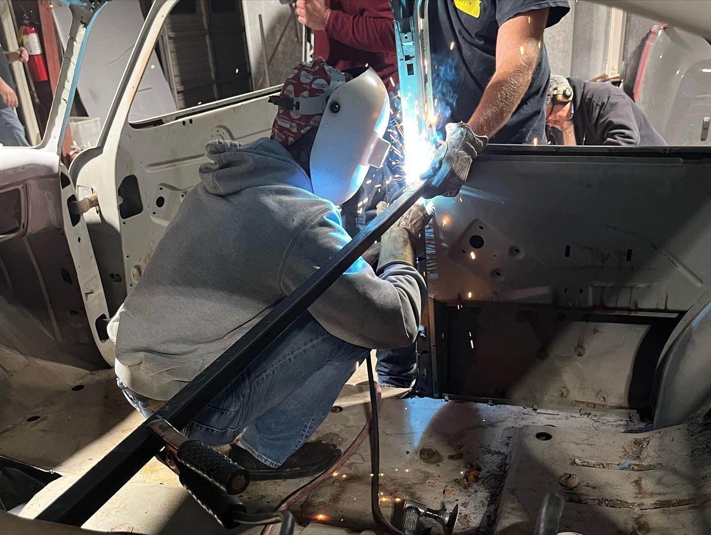 Mechanic Performing Body Repair Work on a Vehicle | 4D Garage