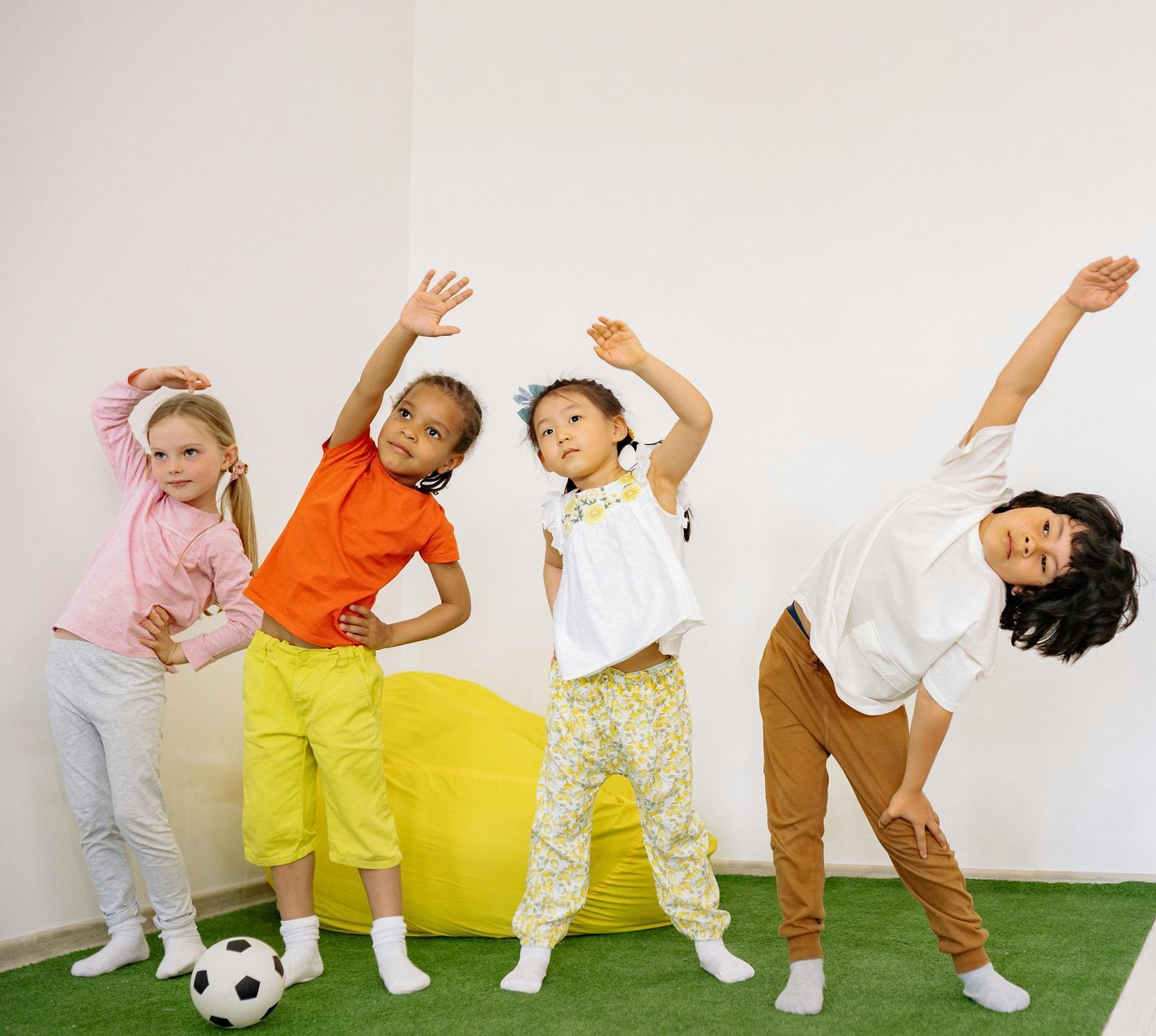 Group of children stretching and exercising