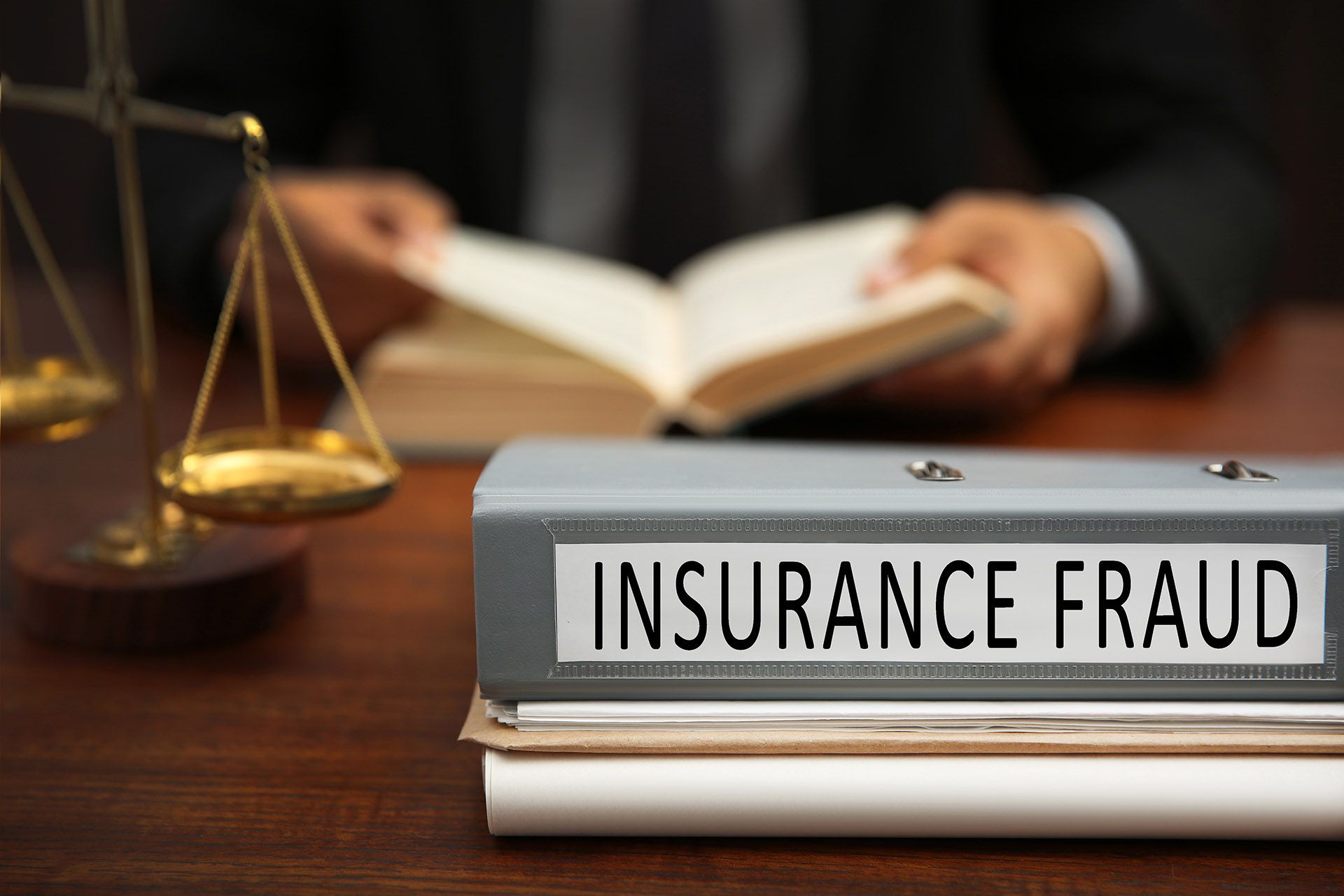 insurance fraud concept folder man on