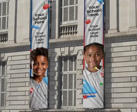 A banner on the side of a building that says your school here