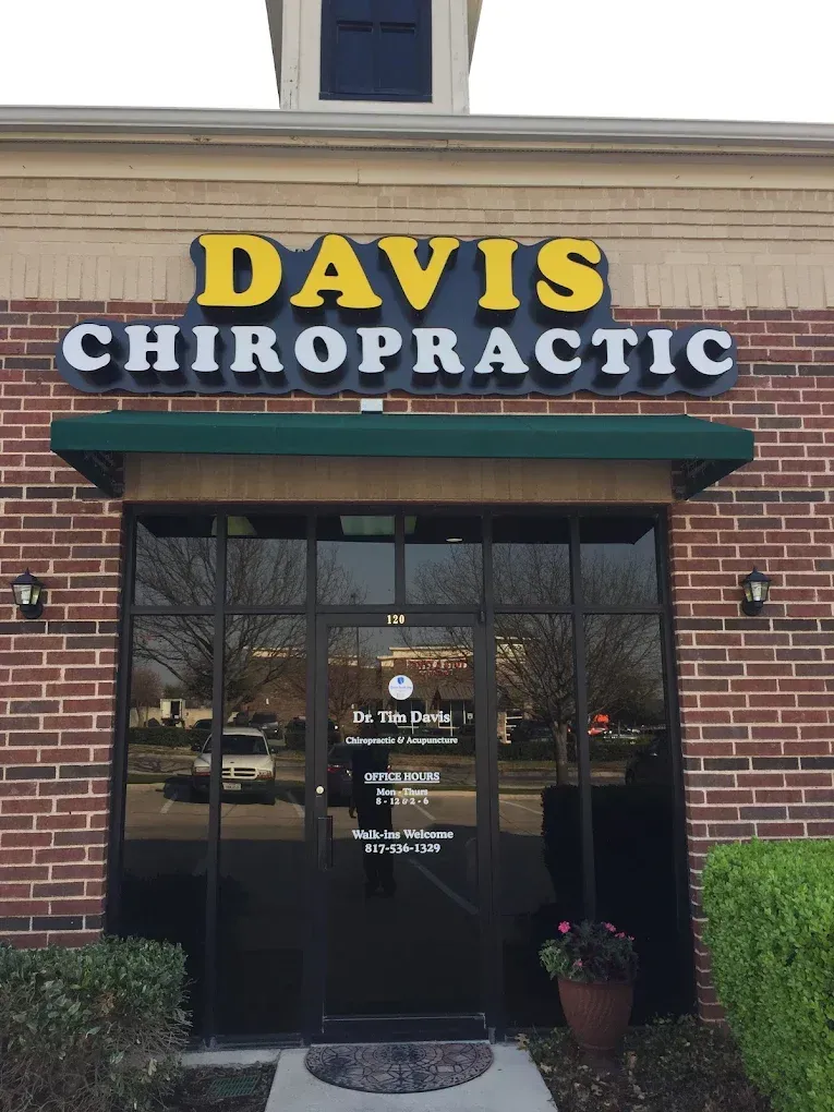 Davis Chiropractic sign above a storefront entrance.