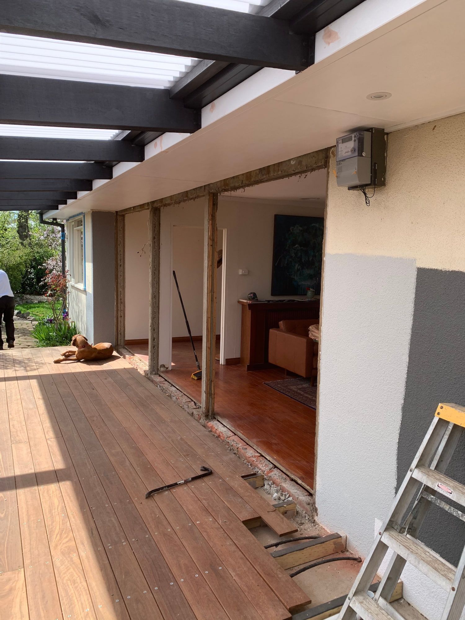 A wooden deck with a ladder in front of it — Renovo Contractors In Monash, ACT