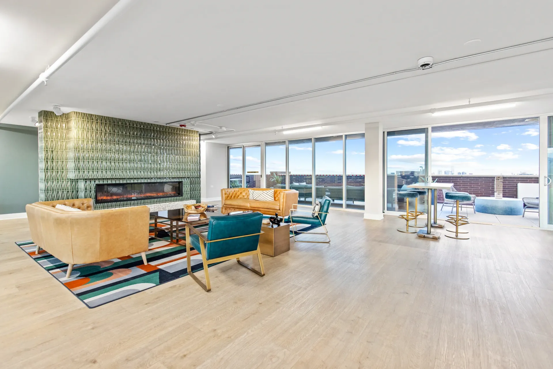Modern lounge area with fireplace and outdoor access