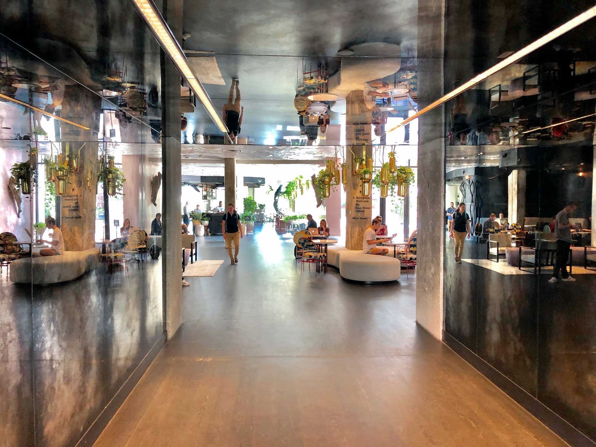 A hotel using a ceiling mirror and making the space look larger. A hotel using a ceiling mirror and making the space look larger.