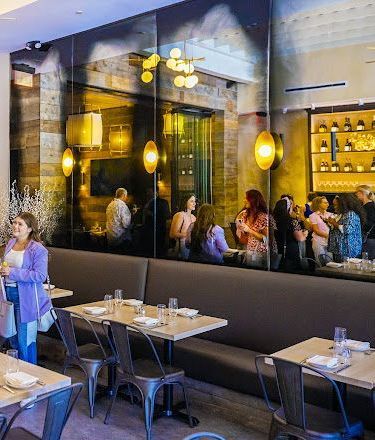Large mirrored walls in a trendy restaurant Large mirrored walls in a trendy restaurant