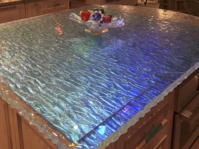 A textured cast glass kitchen countertop in dichroic glass. A textured cast glass kitchen countertop in dichroic glass.