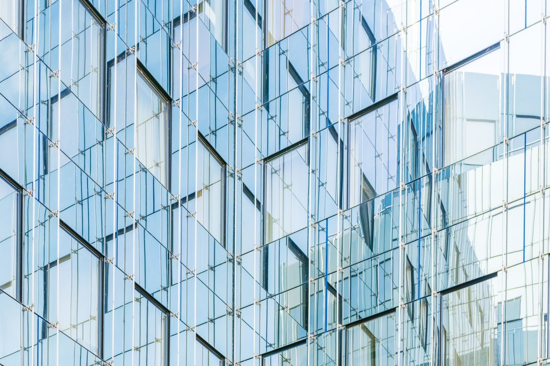 An elegant building constructed of reflective glass. An elegant building constructed of reflective glass.