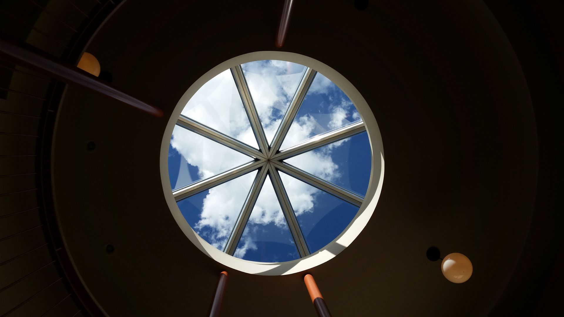 A circular skylight photographed from below. A circular skylight photographed from below.