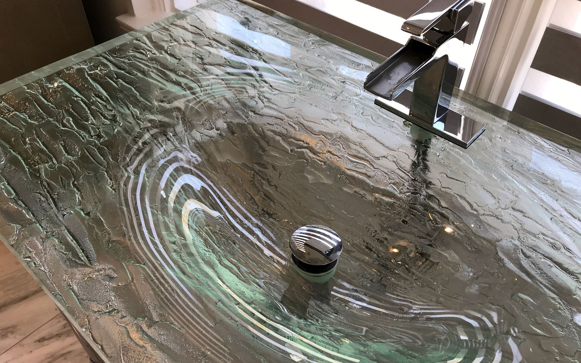 A custom glass top vanity unit from TCG Glass. A custom glass top vanity unit from TCG Glass.