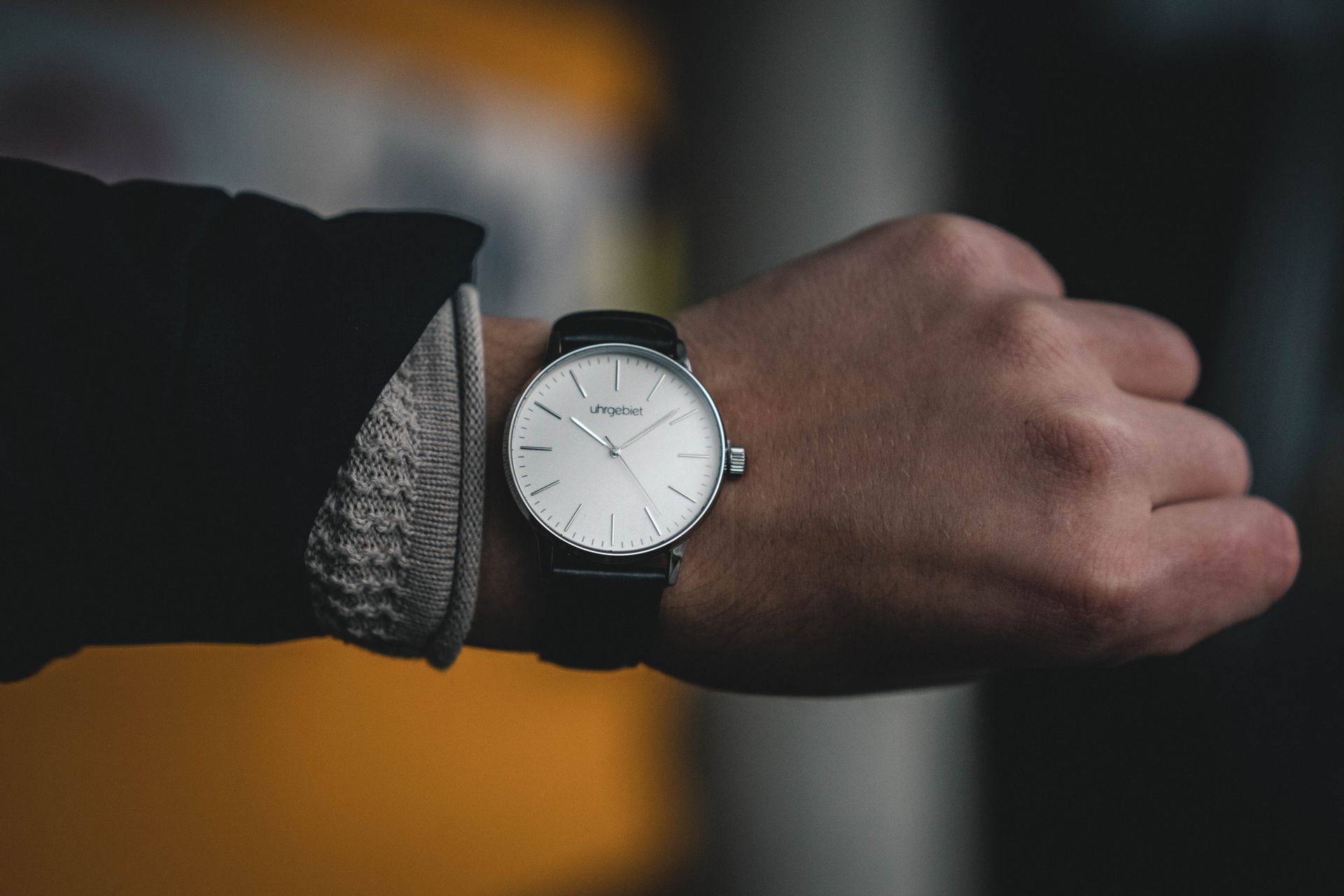A man checking his watch A man checking his watch