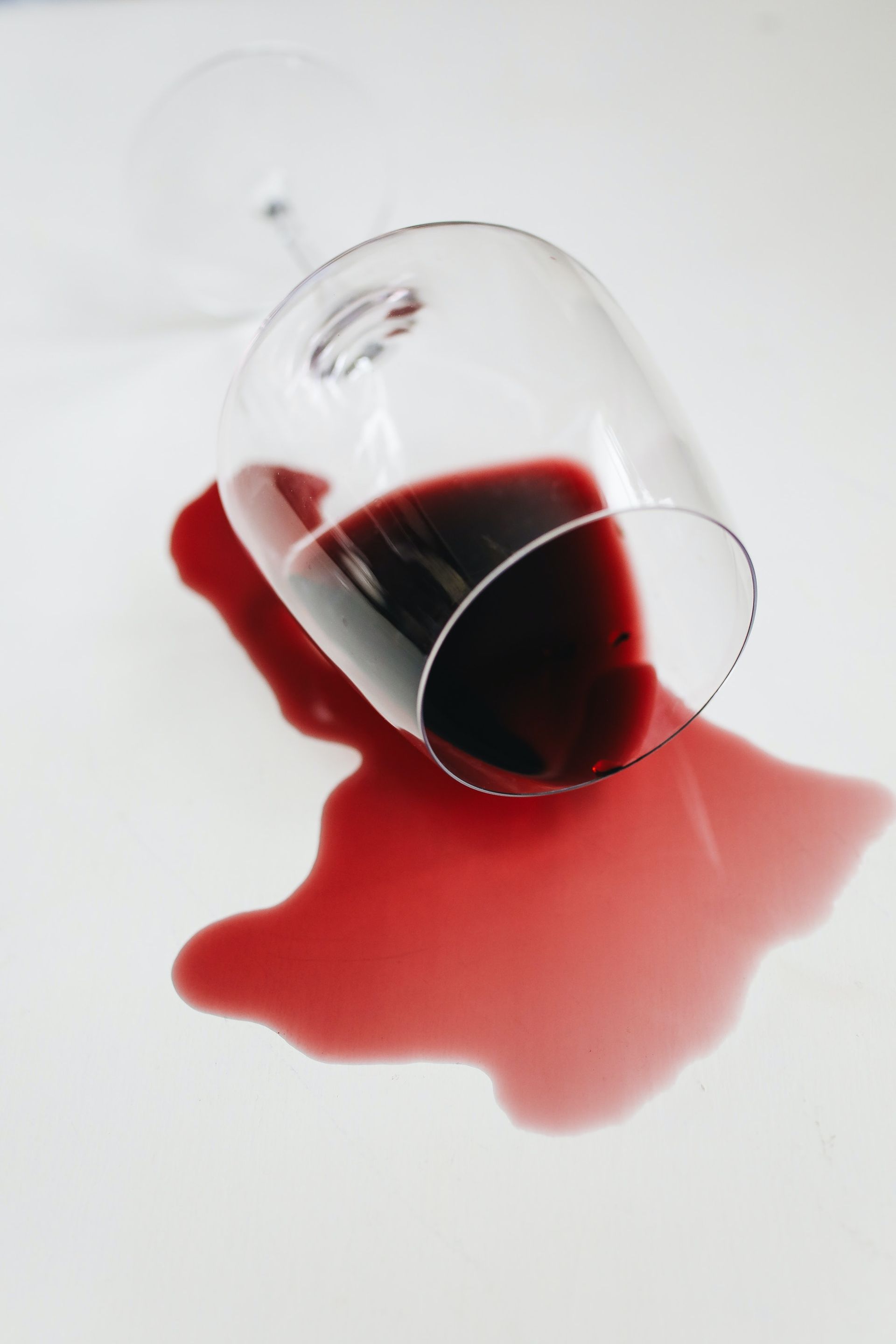 A glass of spilled wine. A glass of spilled wine.