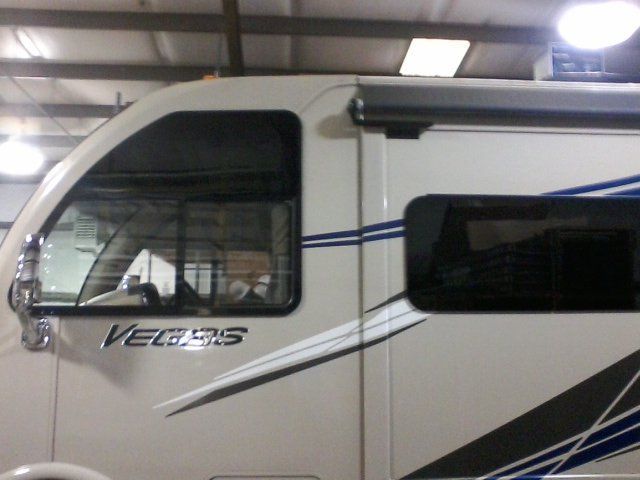 A white van with the word vegas on the side