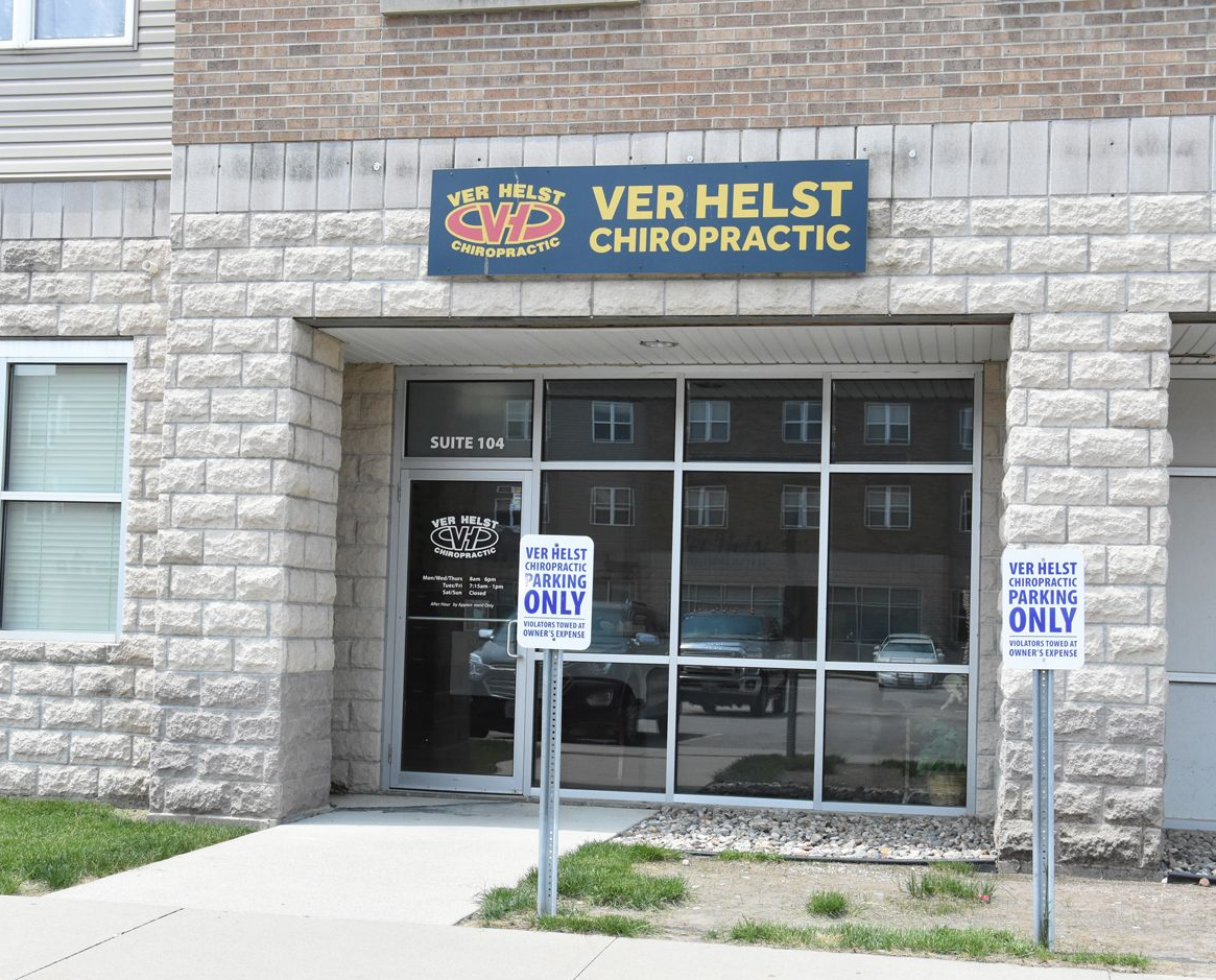 Patient receiving consultation at Ver Helst Chiropractic in Ames Iowa