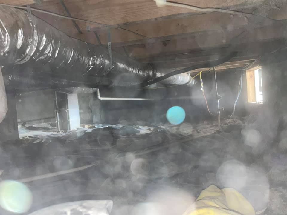 A room with a lot of smoke coming out of it.