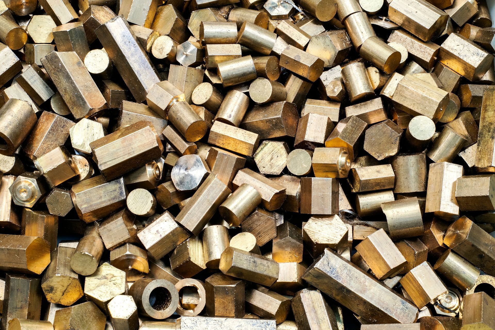 Industrial brass scrap leftovers are gathered for recycling.