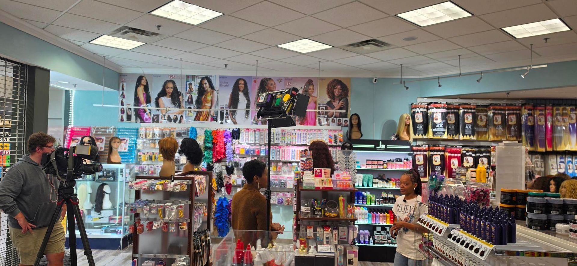 Toy and beauty store aisle with shelves of dolls, cosmetics, and colorful merchandise under bright lights